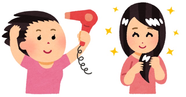 ドライヤーをかける女性 