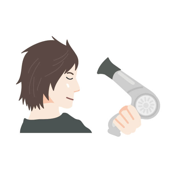 正面からドライヤーをあてているイラスト