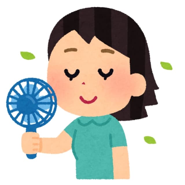 風をあびる女性