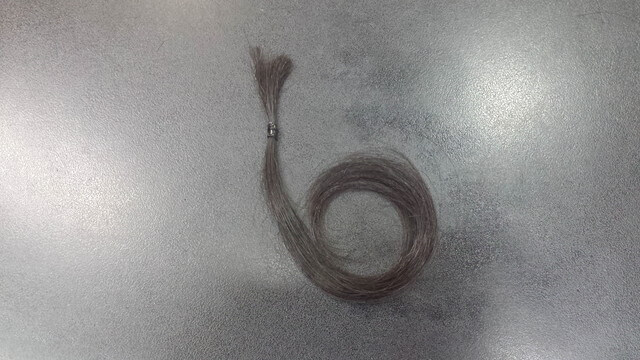 パーマ翌日にシャンプーする髪の毛の写真
