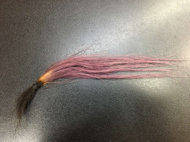 綺麗なピンクアッシュの発色をした髪の毛の写真